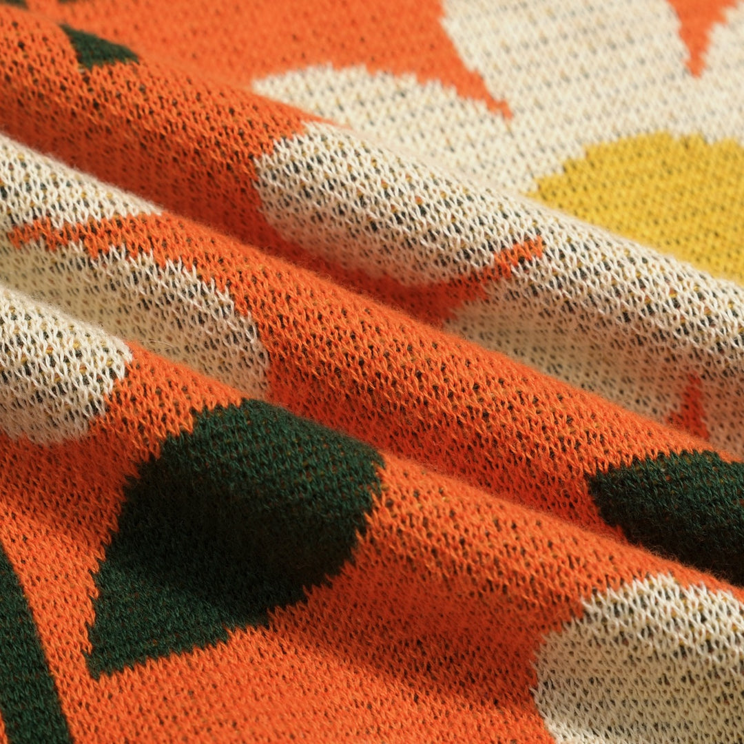 T-shirt en maille jacquard orange à motif floral marguerite années 70 pour femme