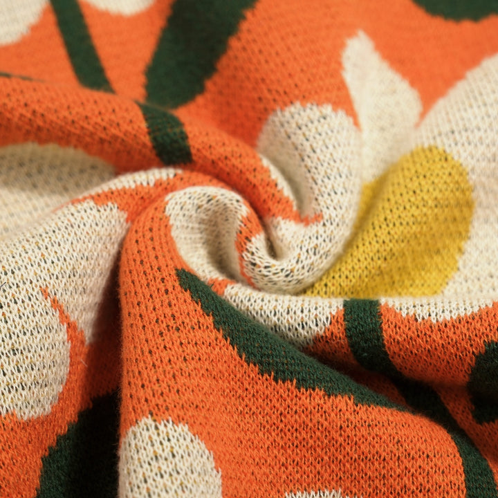 T-shirt en maille jacquard orange à motif floral marguerite années 70 pour femme