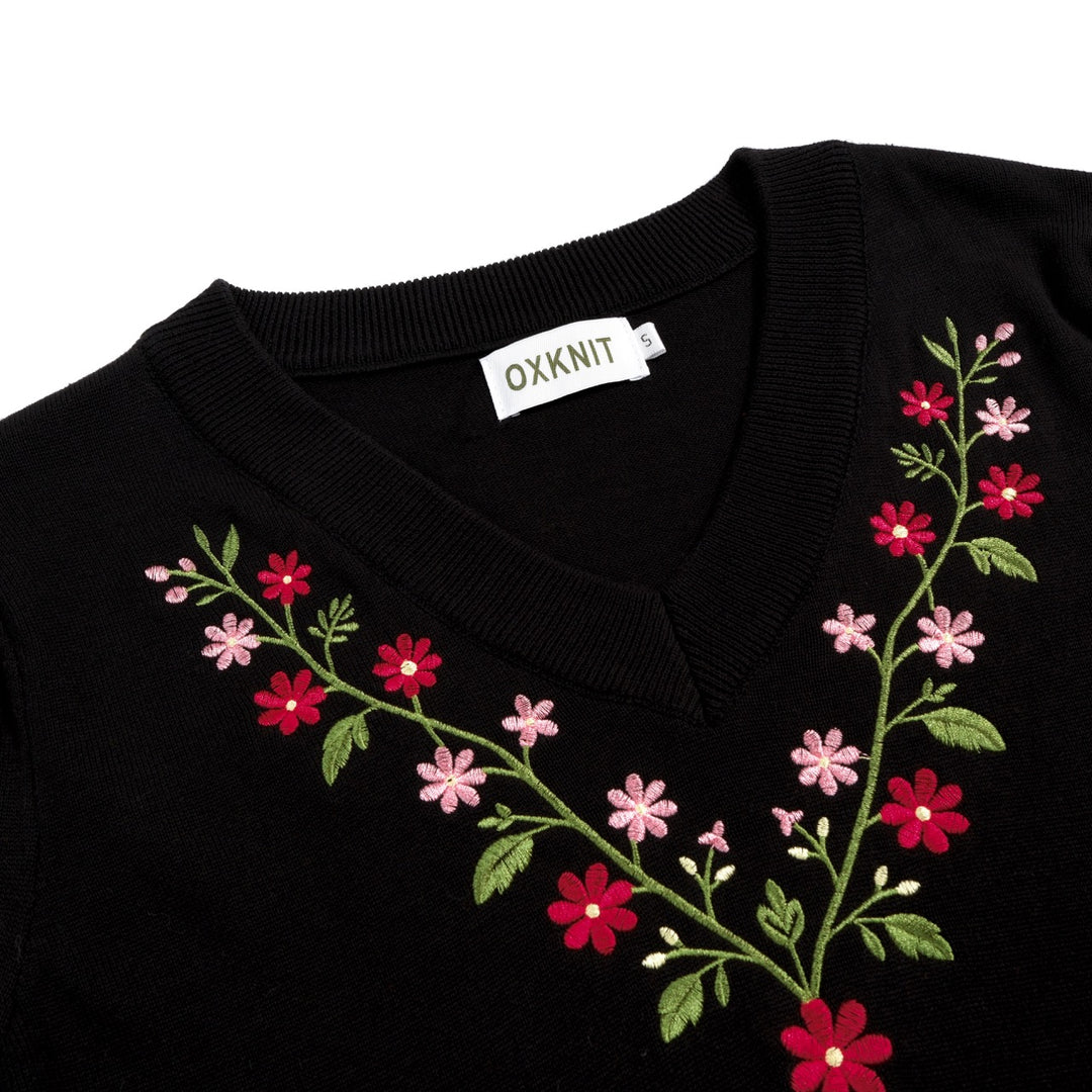 Svart blomsterbrodert strikkekjole med lommer og korte ermer for dame