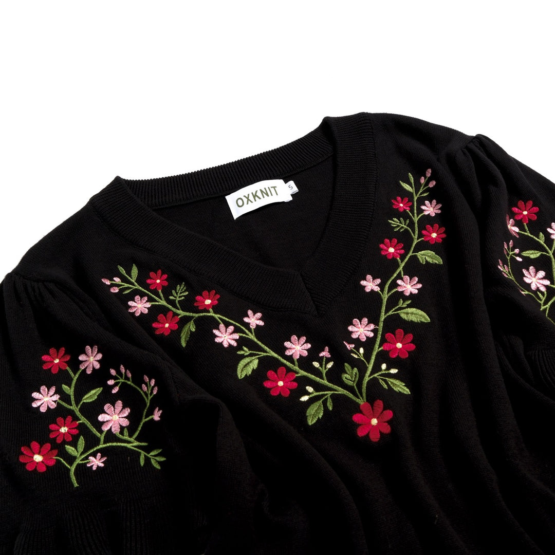 Svart blomsterbrodert strikkekjole med lommer og korte ermer for dame