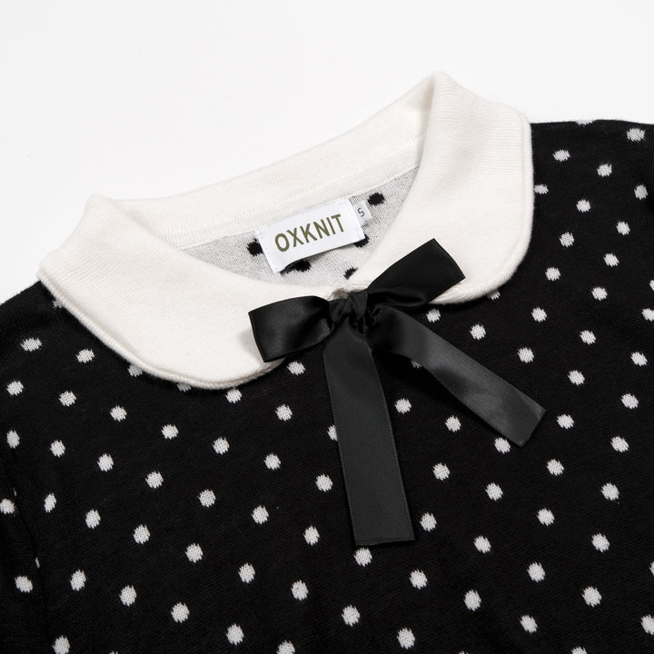 Schwarzes und weißes Damenkleid mit Polka Dots, Peter-Pan-Kragen, Taschen und kurzen Ärmeln aus Strick