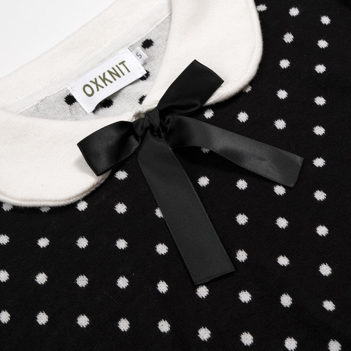 Schwarzes und weißes Damenkleid mit Polka Dots, Peter-Pan-Kragen, Taschen und kurzen Ärmeln aus Strick