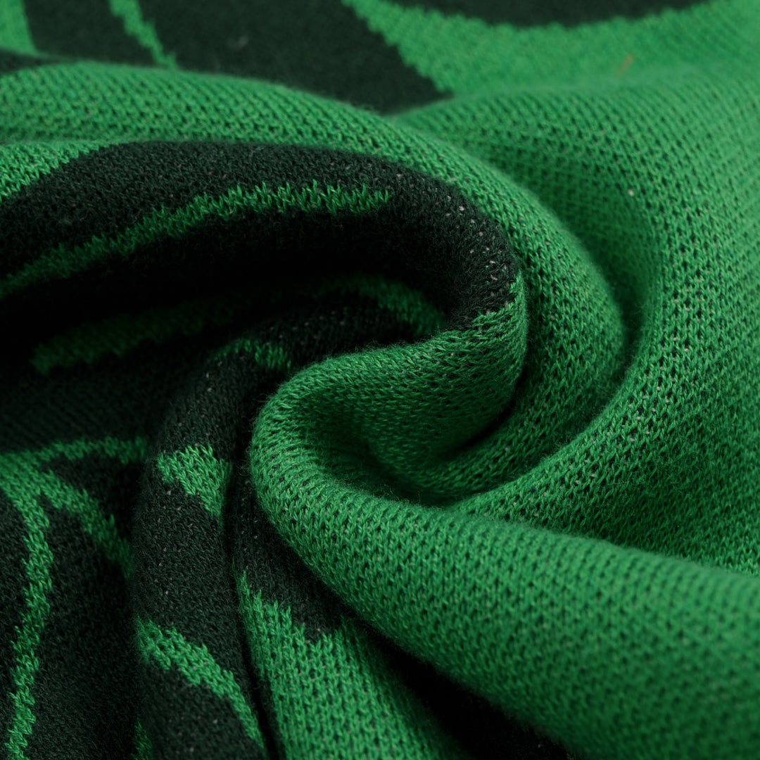 Camiseta de punto jacquard verde para mujer con ilustración tropical de gato y manga corta