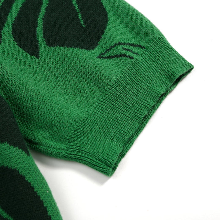 Camiseta de punto jacquard verde para mujer con ilustración tropical de gato y manga corta