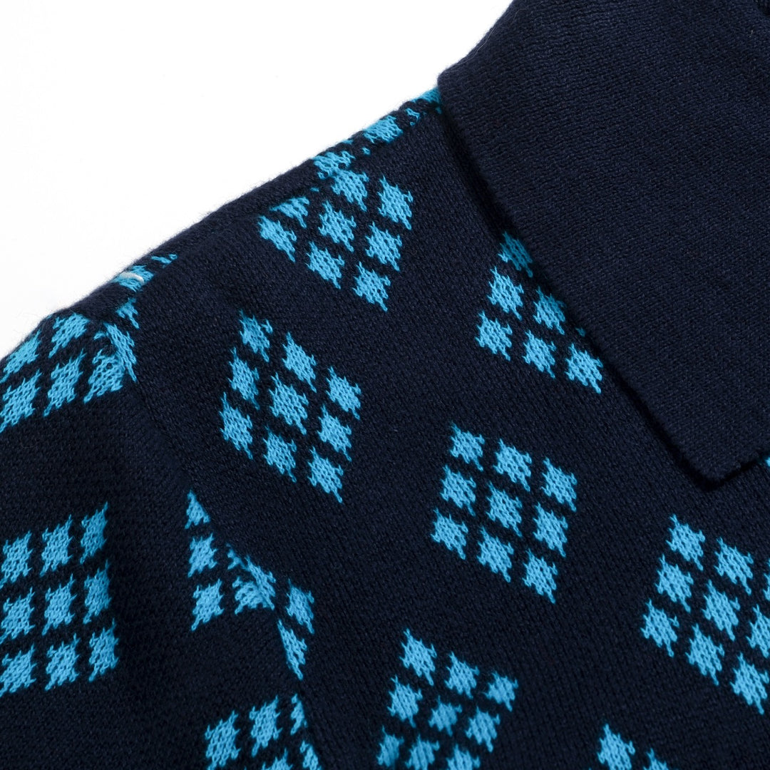Herrarnas mörkblå 60-tals retro stickad polokofta med diamantmönster