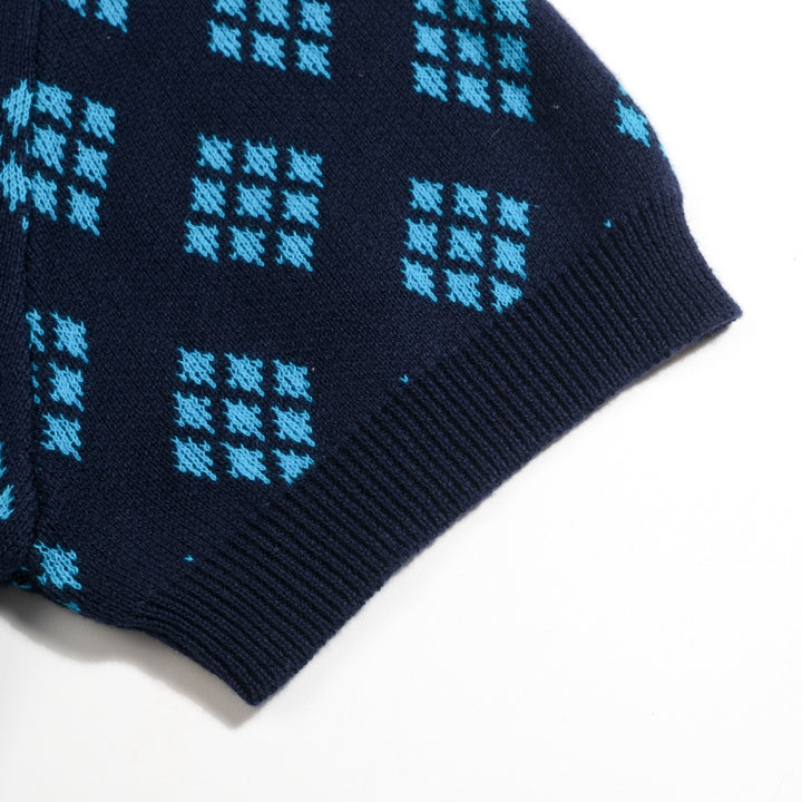 Herrarnas mörkblå 60-tals retro stickad polokofta med diamantmönster