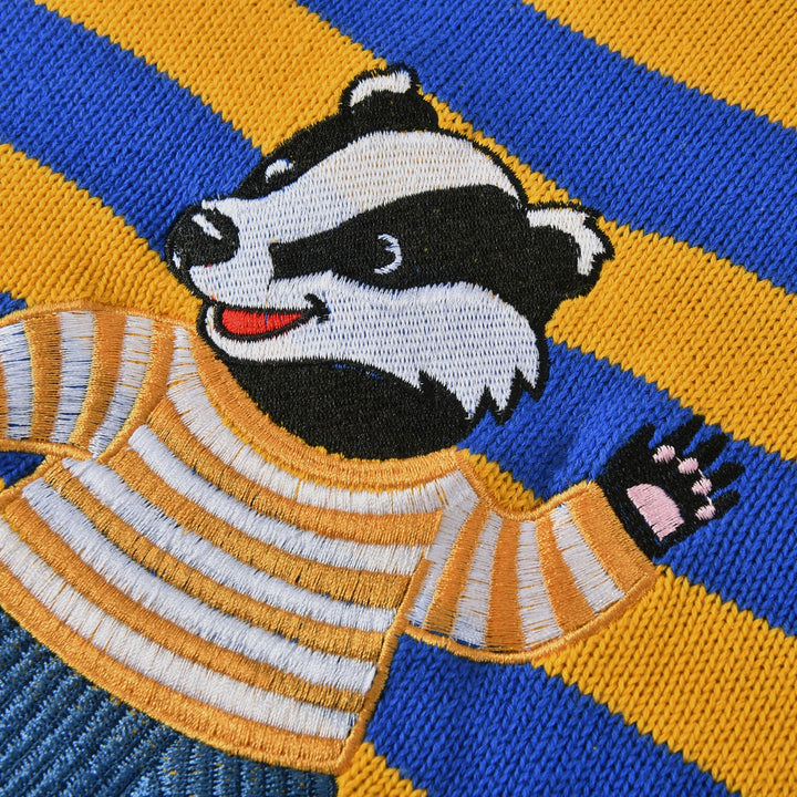 Pull tricoté rayé jaune et bleu pour femme avec blaireau brodé