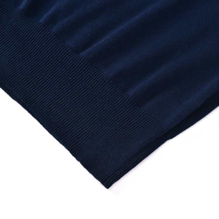 Pull en maille bleu marine pour femme à imprimé léopard des années 70 avec boutons contrastants