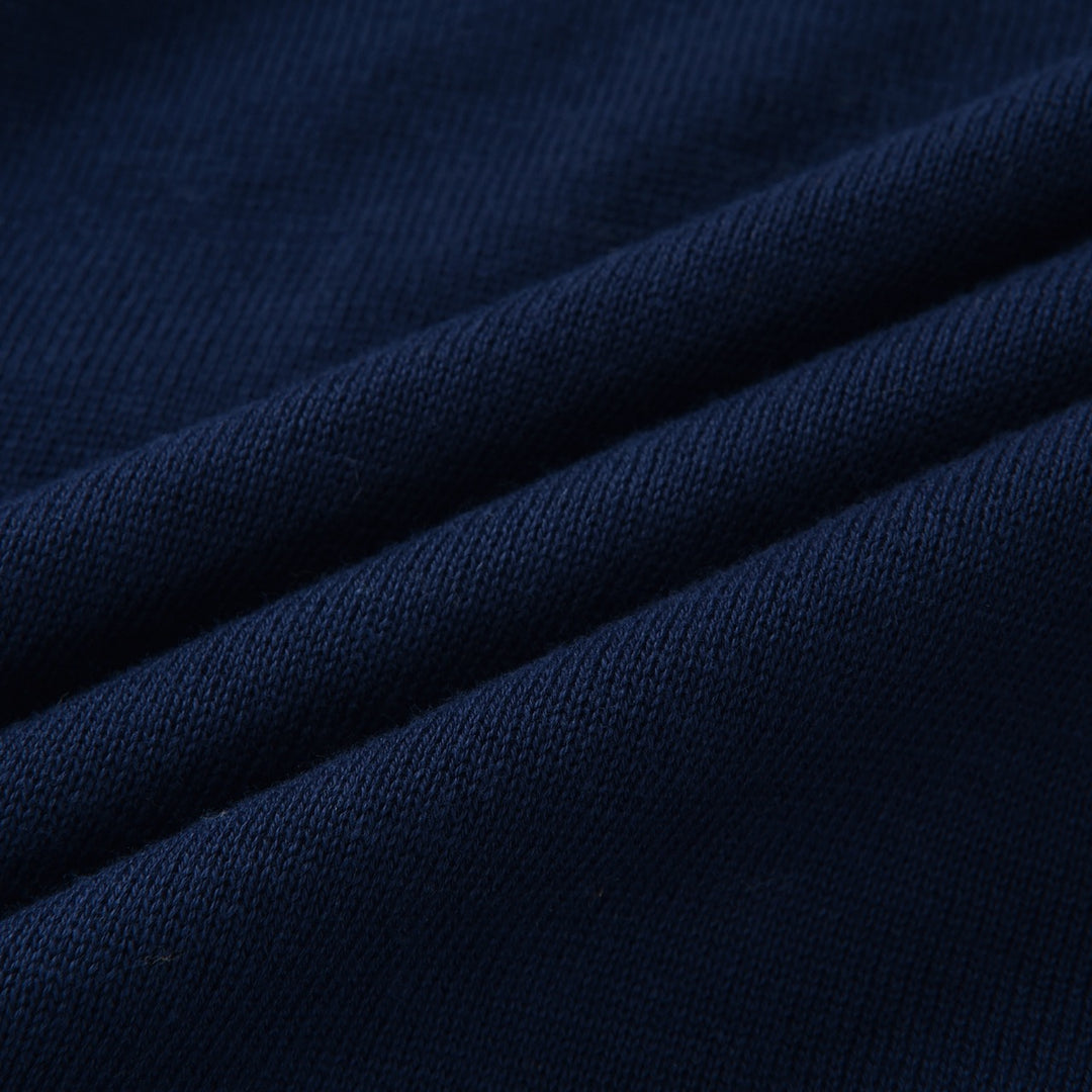 Pull en maille bleu marine pour femme à imprimé léopard des années 70 avec boutons contrastants
