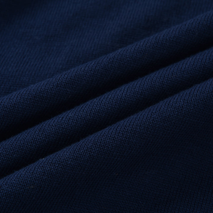 Pull en maille bleu marine pour femme à imprimé léopard des années 70 avec boutons contrastants