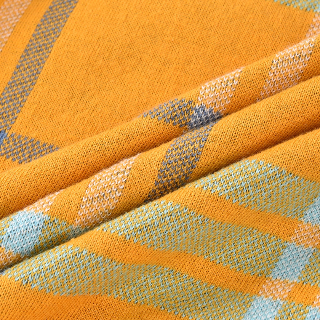 Cárdigan de punto jacquard retro de los 70 para hombre en mostaza y naranja