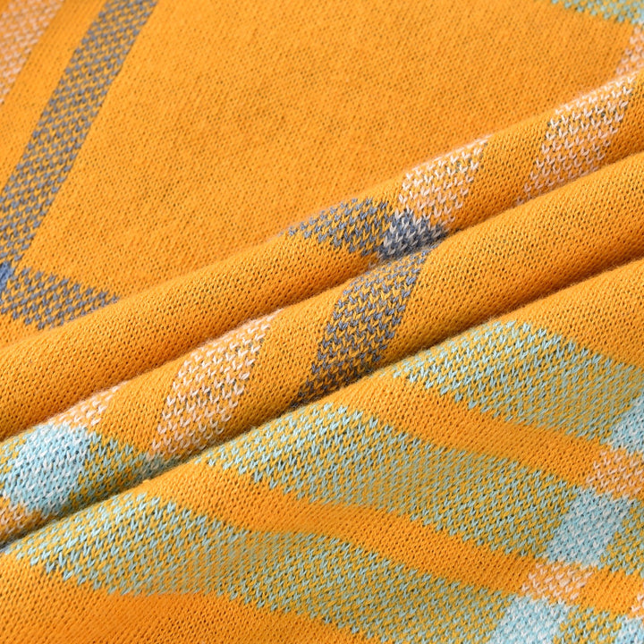 Cárdigan de punto jacquard retro de los 70 para hombre en mostaza y naranja