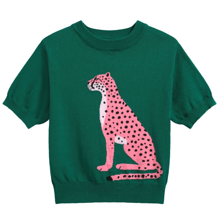 Women's green short sleeve knit top with a pink and black cheetah jacquard design, crew neckline, and ribbed cuffs and hem.