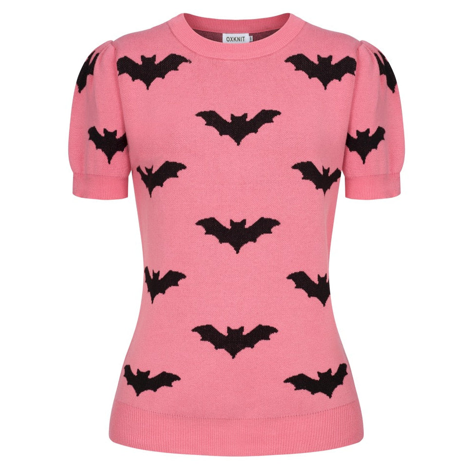 Women's pink jacquard knit top with black bat motifs, short puff sleeves and a ribbed crew neckline and hem.